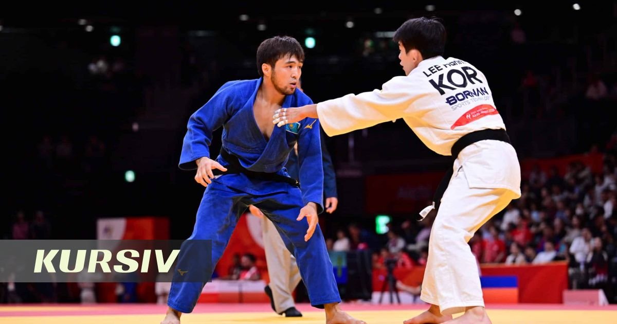 Kazakh judoka Yeldos Smetov on the podium at the 2026 Asian Games
