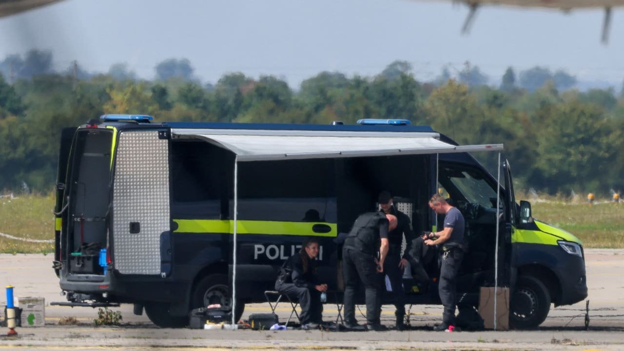Police officers working at the scene where a drone was discovered at Leipzig/Halle Airport, August 5, 2026.