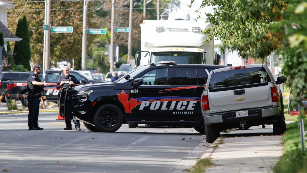 Police vehicles and investigation scene near synagogue in Belleville, Ontario