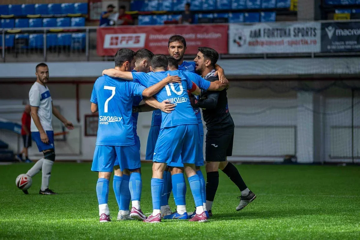 Zira mini-football players celebrating their Champions League quarter-final qualification