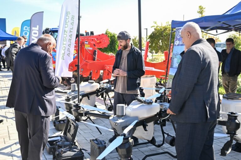 Participants viewing exhibition stands at the 100th Anniversary Agrarian Business Festival in Aghdam district