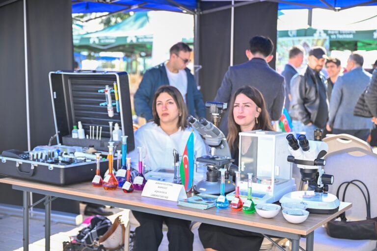 Participants viewing exhibition stands at the 100th Anniversary Agrarian Business Festival in Aghdam district