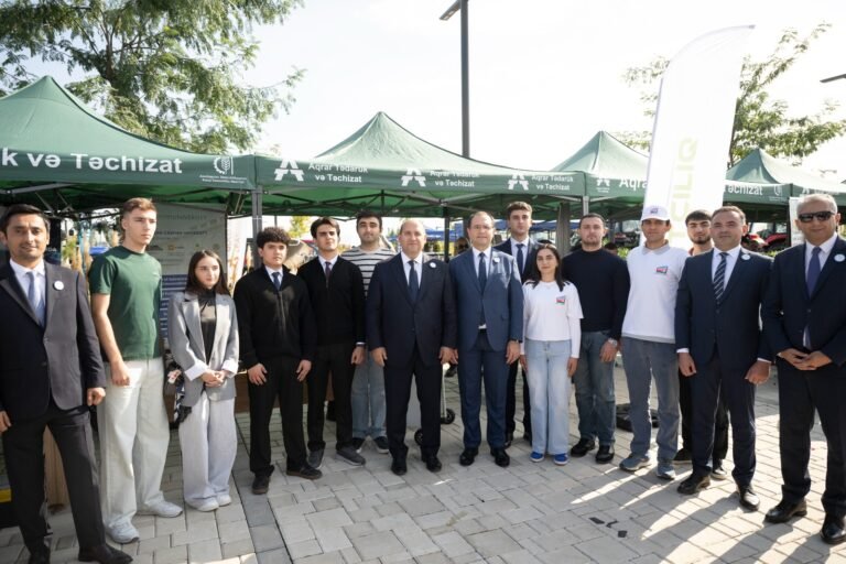 Participants viewing exhibition stands at the 100th Anniversary Agrarian Business Festival in Aghdam district