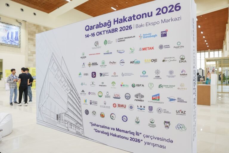 Participants working at the Karabakh Hackathon 2026 during the Rebuild Karabakh exhibition
