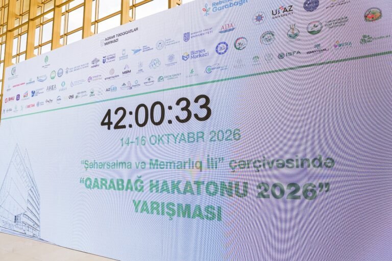 Participants working at the Karabakh Hackathon 2026 during the Rebuild Karabakh exhibition