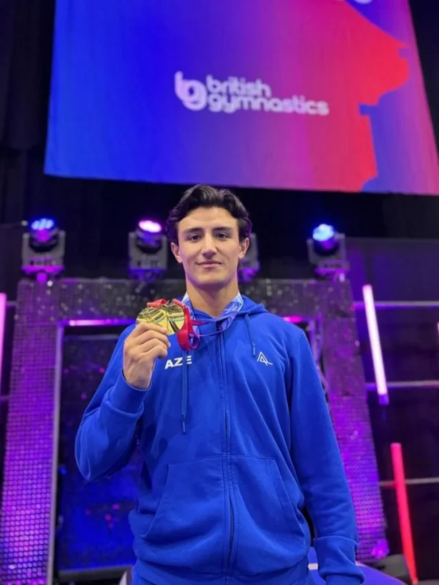 Tofik Aliyev of Azerbaijan national trampoline team with two gold medals